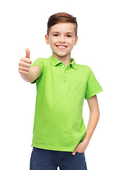 Image showing happy boy in green polo t-shirt showing thumbs up