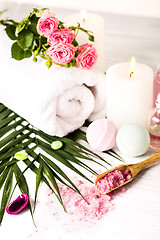 Image showing Spa setting with pink roses and aroma oil, vintage style 