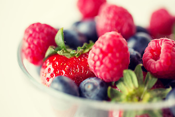 Image showing close up of summer berries in glass bowl