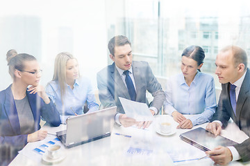 Image showing business team with laptop having discussion