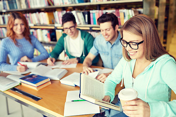 Image showing students reading and drinking coffee in library