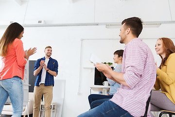 Image showing creative team celebrating success