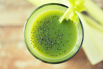 Image showing close up of fresh green juice glass and celery