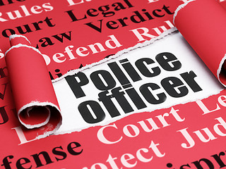 Image showing Law concept: black text Police Officer under the piece of  torn paper