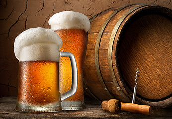 Image showing Cold beer and barrel