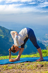Image showing Woman doing Ashtanga Vinyasa yoga outdoors