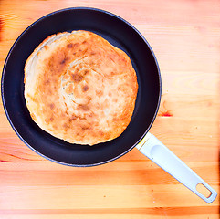 Image showing pita bread in a pan