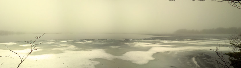 Image showing Foggy morning over spring lake