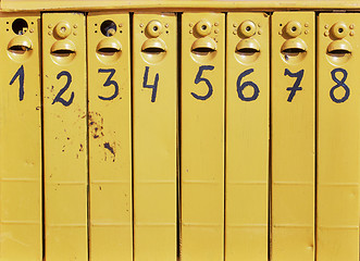 Image showing eight old mail boxes