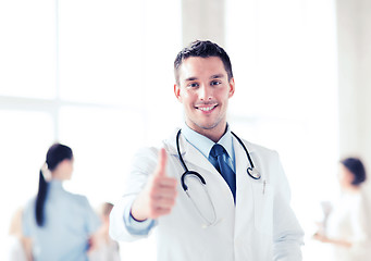 Image showing doctor with stethoscope showing thumbs up