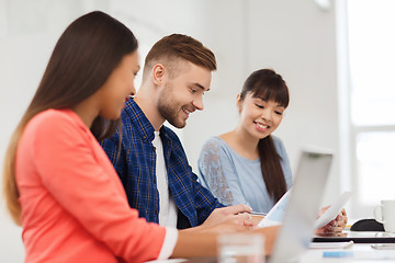 Image showing happy creative team or students working at office