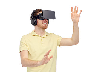 Image showing happy man in virtual reality headset or 3d glasses