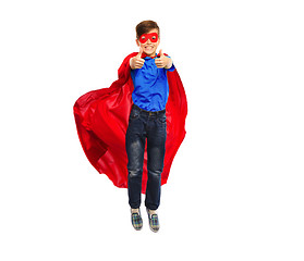 Image showing boy in super hero cape and mask showing thumbs up