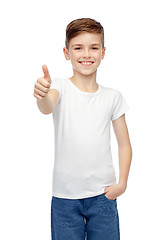 Image showing happy boy in white blank t-shirt showing thumbs up