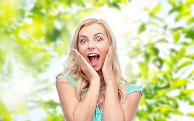 Image showing surprised smiling young woman or teenage girl