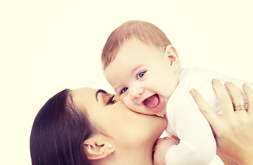 Image showing mother kissing her baby