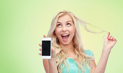 Image showing happy young woman or teenage girl with smartphone