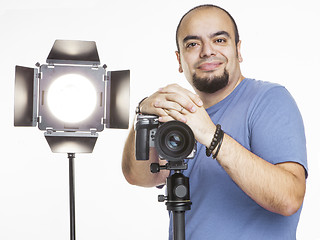 Image showing professional photographer with photographic equipment