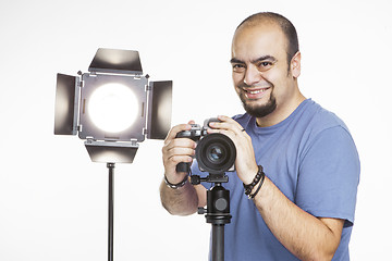 Image showing professional photographer with photographic equipment