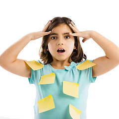 Image showing Girl with yellow notes