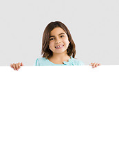 Image showing Girl holding a whiteboard