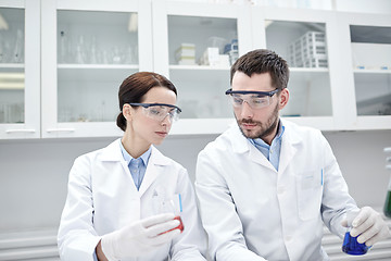 Image showing young scientists making test or research in lab