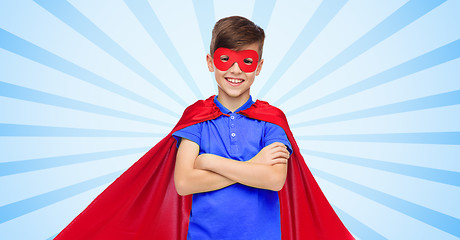 Image showing boy in red super hero cape and mask