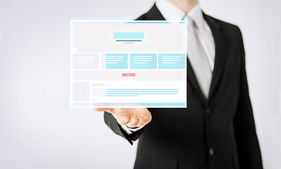 Image showing close up of businessman showing web page design