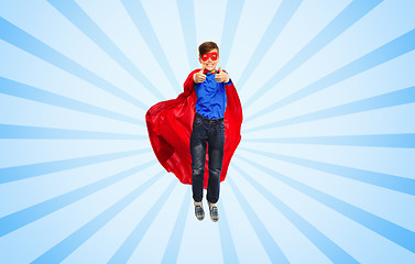 Image showing boy in super hero cape and mask showing thumbs up