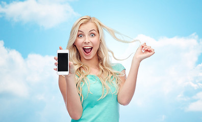 Image showing happy young woman or teenage girl with smartphone