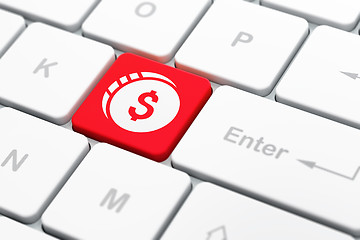 Image showing Currency concept: Dollar Coin on computer keyboard background