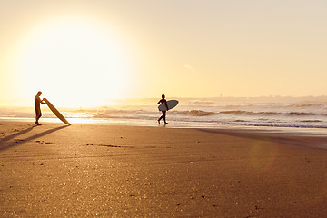 Image showing Surfers on the beach