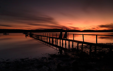 Image showing Summer sunset silhouettes at Kincumber jetty