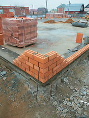 Image showing construction of the brick building