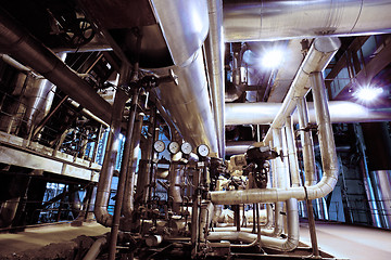 Image showing Equipment, cables and piping as found inside of a modern industr