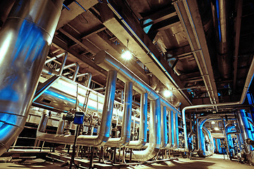 Image showing Equipment, cables and piping as found inside of a modern industr