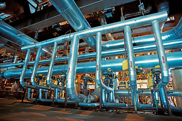 Image showing Equipment, cables and piping as found inside of a modern industr