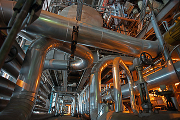 Image showing Equipment, cables and piping as found inside of a modern industr