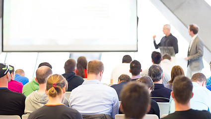 Image showing Male speeker having talk at public event.