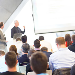 Image showing Male speeker having talk at public event.