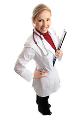 Image showing Smiling female doctor with medical folder