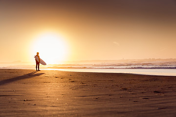 Image showing Surfers on the beach