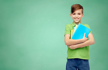 Image showing happy student boy with folders and notebooks