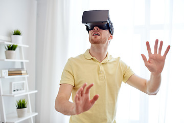 Image showing young man in virtual reality headset or 3d glasses