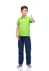 Image showing happy boy in green polo t-shirt showing thumbs up