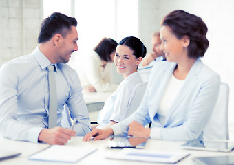 Image showing business team discussing something in office