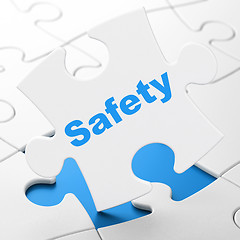 Image showing Security concept: Safety on puzzle background