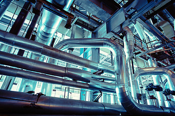 Image showing Equipment, cables and piping as found inside of a modern industr