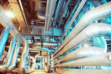 Image showing Equipment, cables and piping as found inside of a modern industr