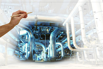 Image showing man\'s hand draws a design of factory combined with photo of mode